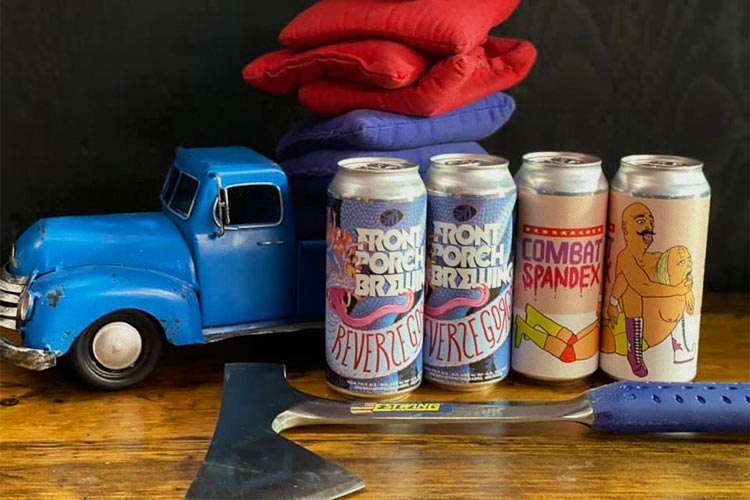 A small blue pickup truck with beer and an Axe.